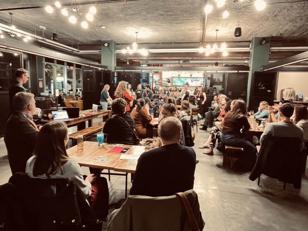 people sitting in a brewery